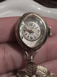 Vintage floral Crosby gold watch brooch