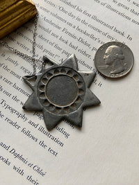 One-of-one | vintage carved silver sun stainless steel necklace