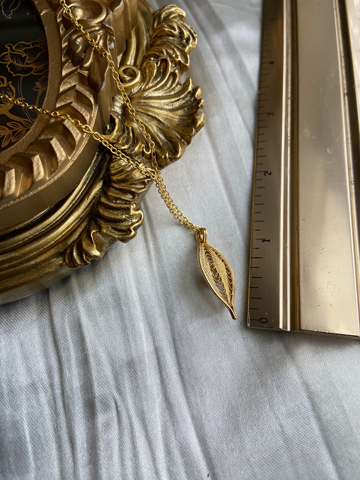 One-of-one | gold pearl leaf Necklace