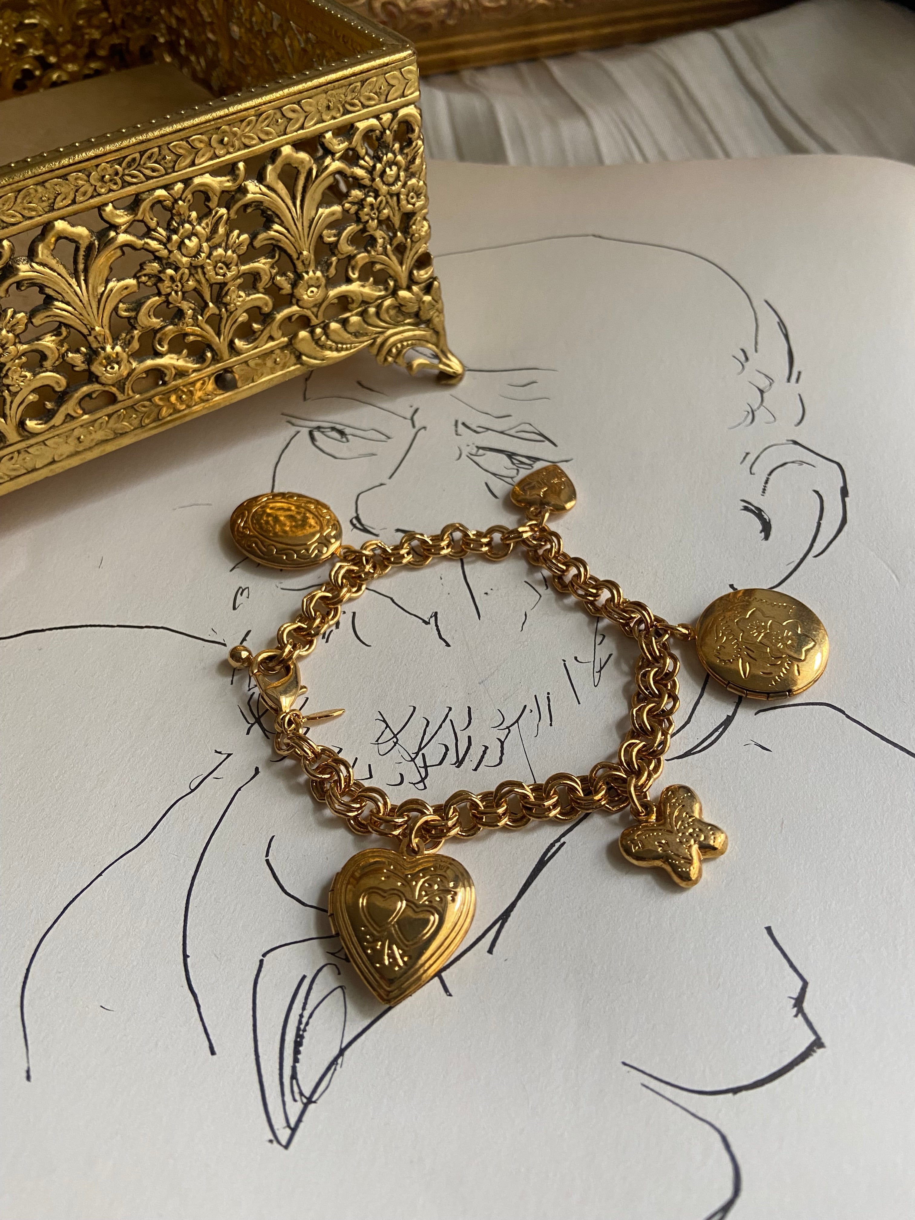 gold charm bracelet with lockets   • — Vivian Vintage Collection • only 1 available • View all photos; item is thrifted/vintage and may show flaws: (  )