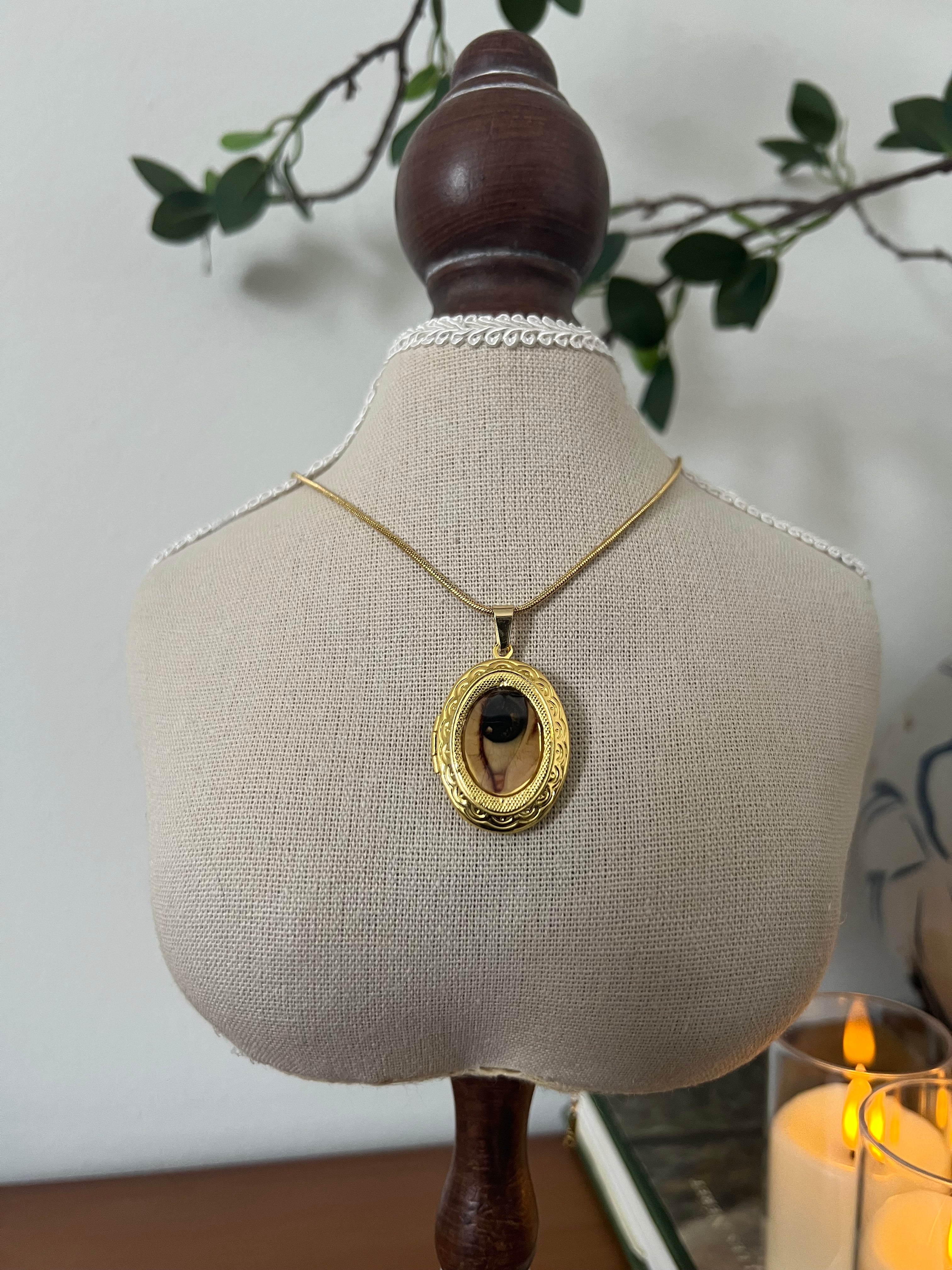 Eye locket necklace