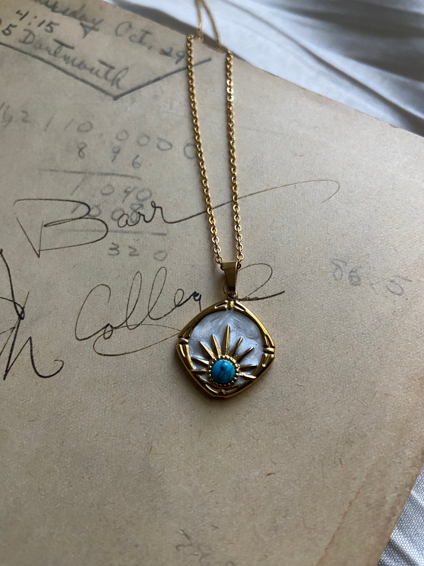 diamond blue stone sun rays necklace