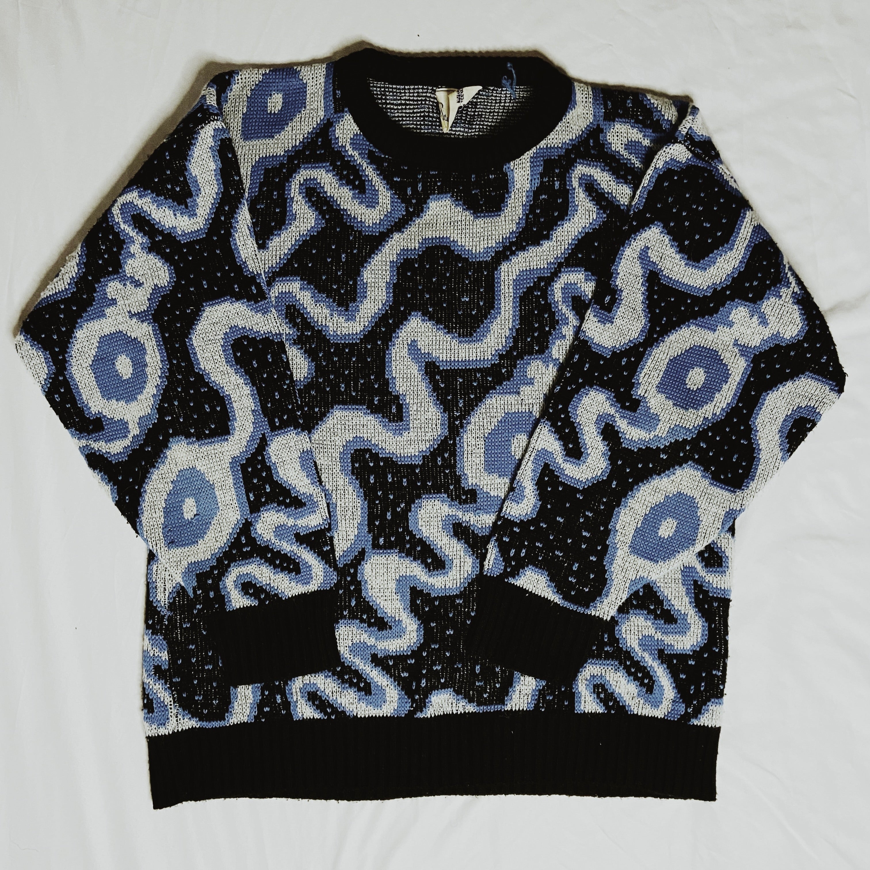 Blue and black sweater with a unique pattern knitwear / small medium