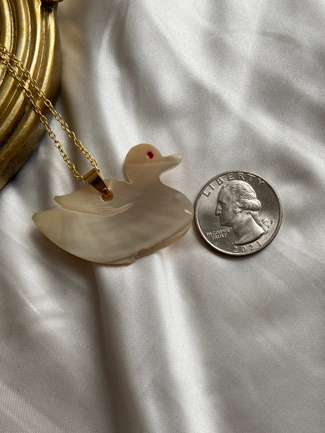 One-of-one | Vintage pearl red eye carved duck necklace
