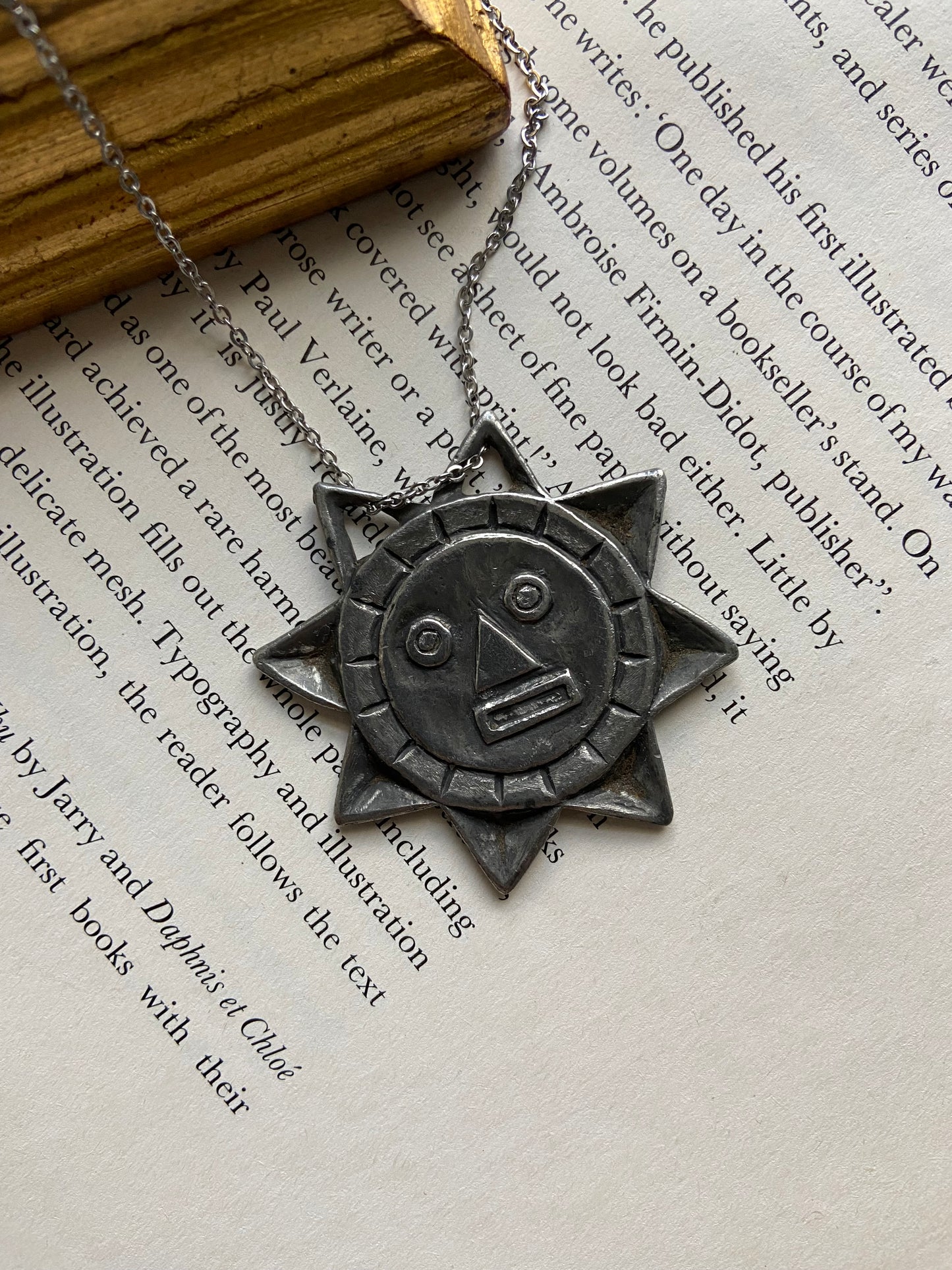 One-of-one | vintage carved silver sun stainless steel necklace
