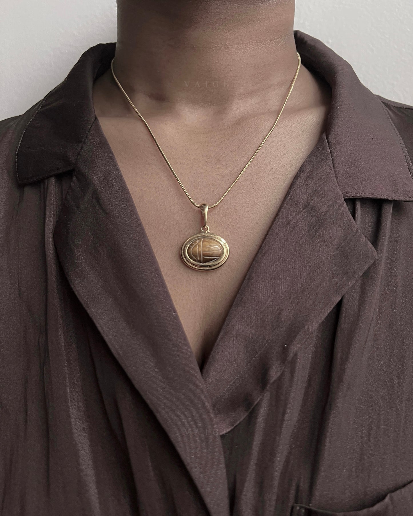 One Of One | vintage tigers eye stone scarab engraved necklace