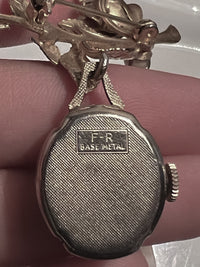 Vintage floral Crosby gold watch brooch