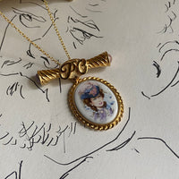 gold porcelain lady   necklace • 18in — Vivian Vintage Collection • only 1 available • View all photos; item is thrifted/vintage and may show flaws: (  )