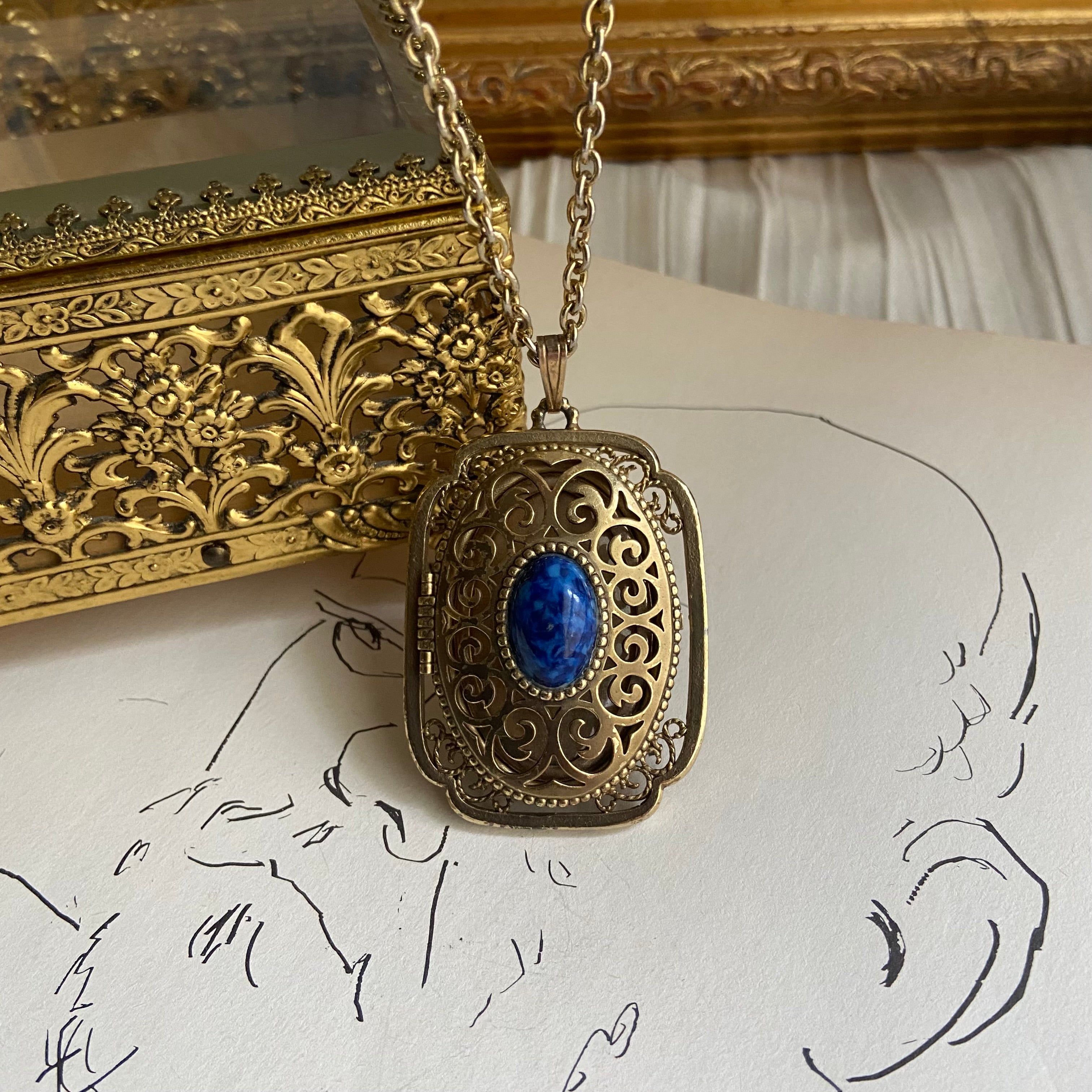 gold avon blue vintage locket  necklace • 20in — Vivian Vintage Collection • only 1 available • View all photos; item is thrifted/vintage and may show flaws: (  )