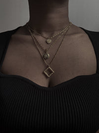 VAIGE One of One | Four leaf clover zirconia gold locket necklace
