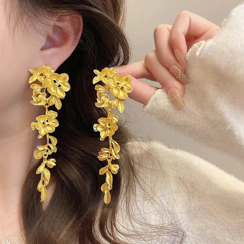 VAIGE Elegant Hollow Metal Flower & Leaf Tassel Drop Earrings - Vintage Glam for Banquet Events (Available in Gold and Silver)