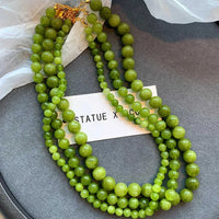 VAIGE Luxurious Natural Green Stone Round Beads Necklace - Classic French Fashion Jewelry for Parties, Featuring a Stylish Pendant and Copper Accents