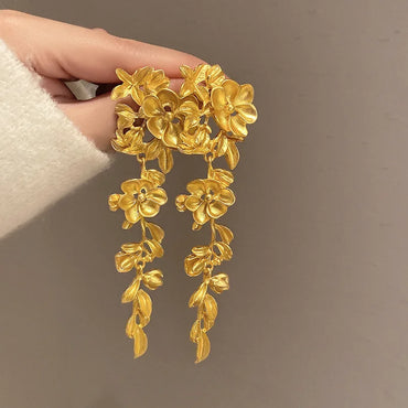 VAIGE Elegant Hollow Metal Flower & Leaf Tassel Drop Earrings - Vintage Glam for Banquet Events (Available in Gold and Silver)