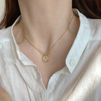 VAIGE Elegant Gold Rose Shell Pendant Necklace in Shimmering Stainless Steel