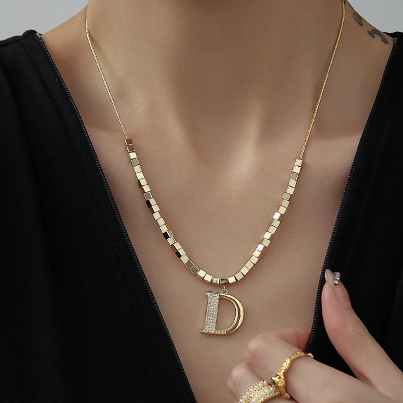 VAIGE Elegant Gold-Plated D Letter Pendant Choker Necklace in Copper Alloy - Unique Fashion Accessory for Any Occasion