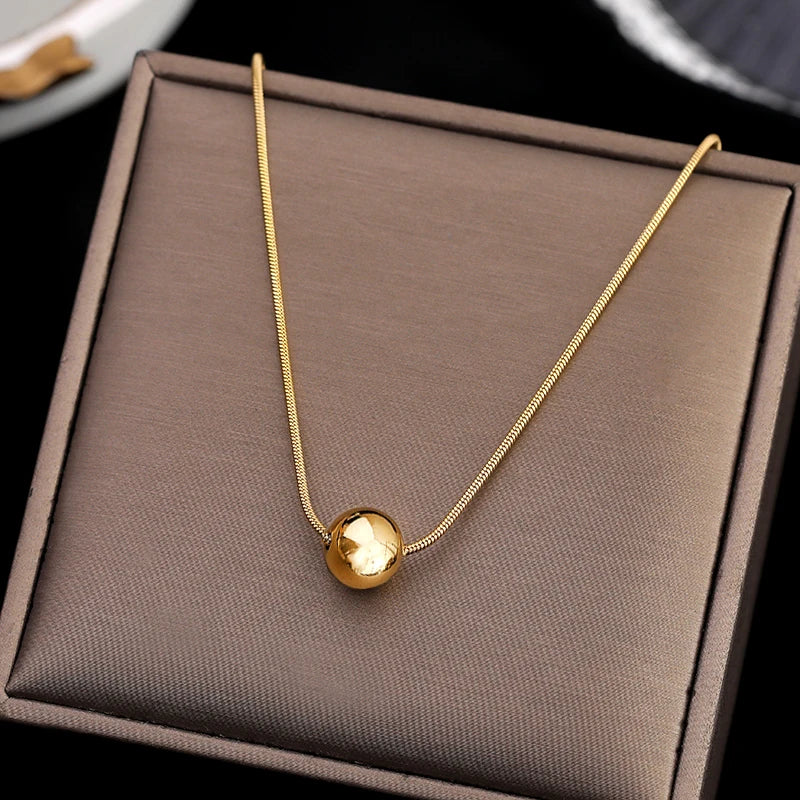 VAIGE Classic Round Pendant Stainless Steel Short Necklace - Elegant Snake Chain Clavicle Accessory for Any Occasion